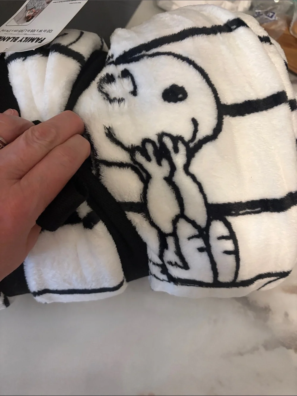 Peanuts Black and White Snoopy Roll-Up Plush Blanket
